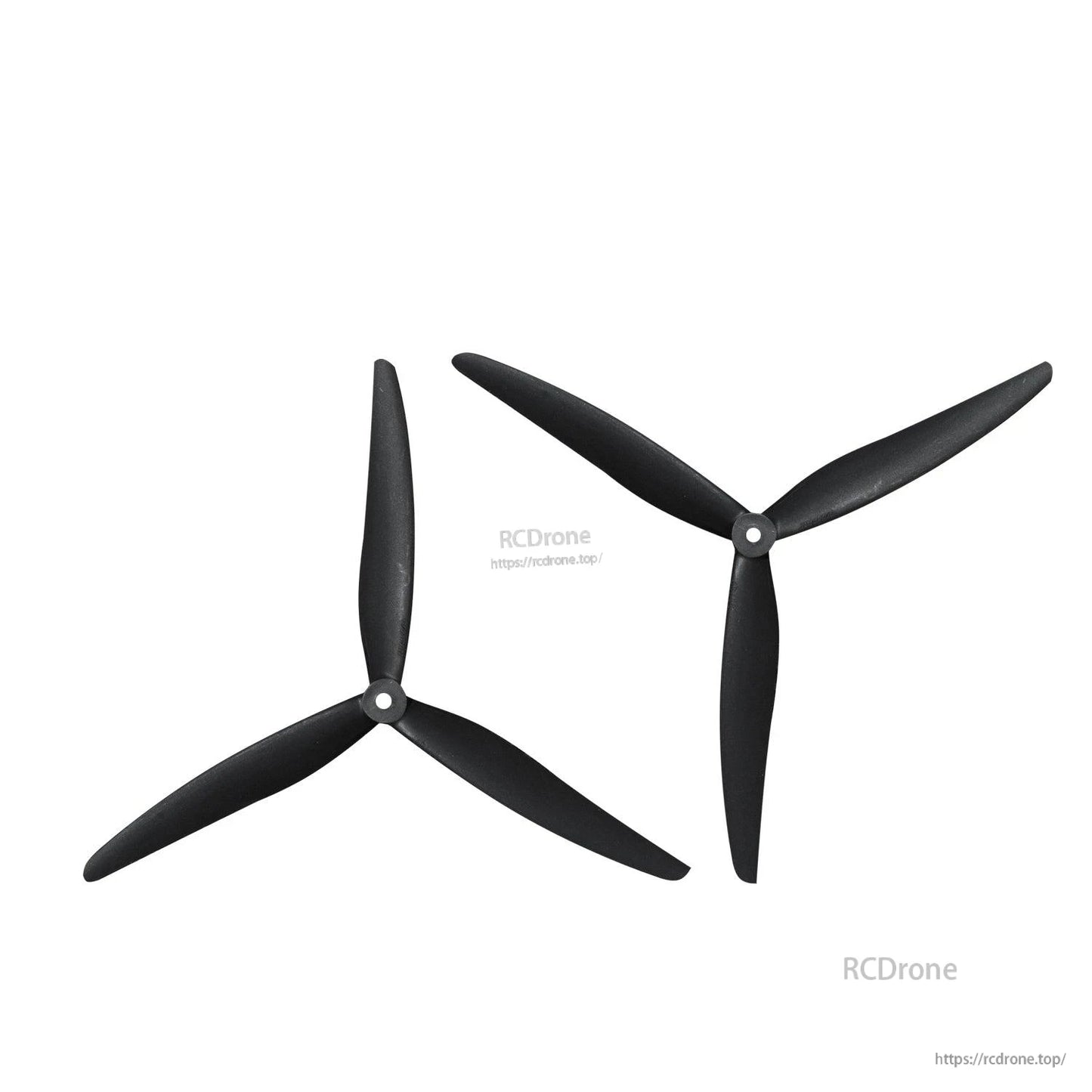 Two tri-blade propellers in alternate orientations, showing blade pitch and hub detail
