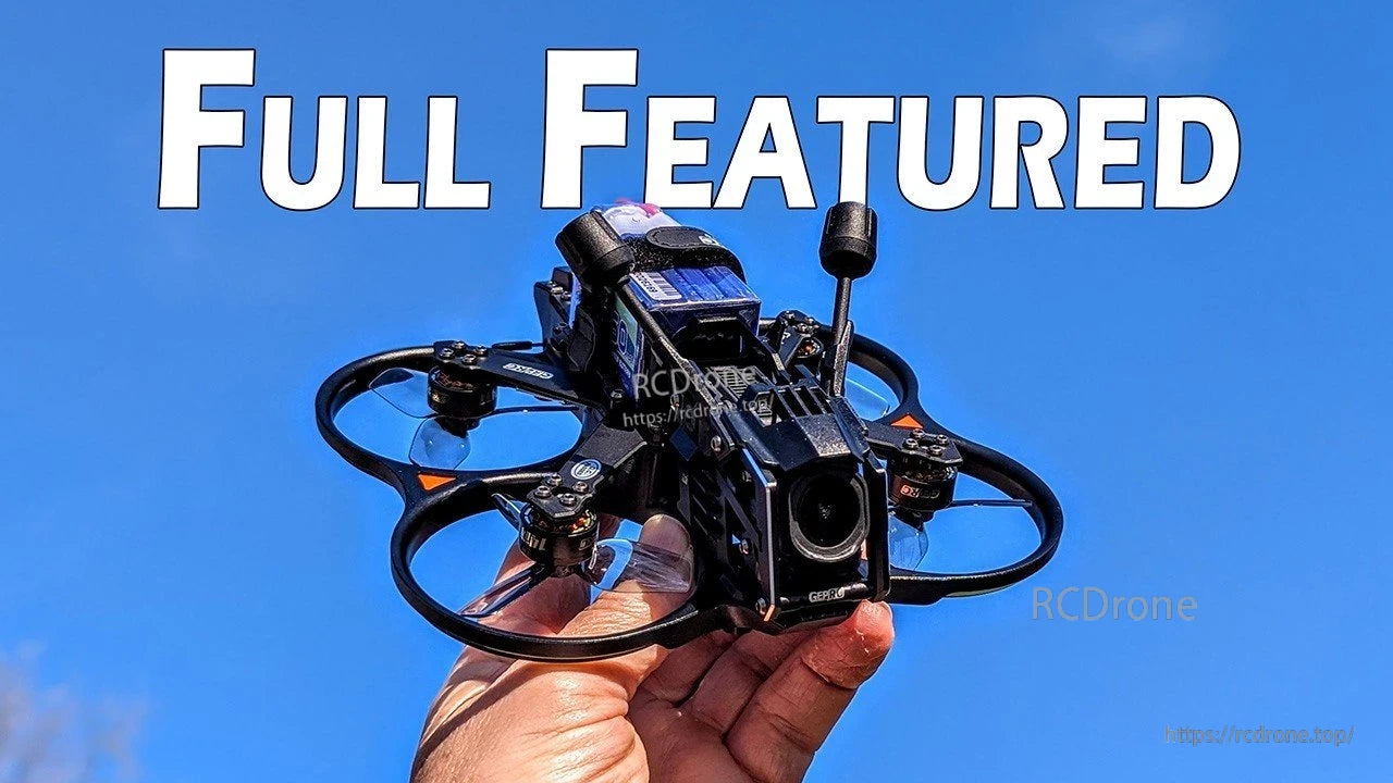GEPRC Cinebot25 V2 O4 Pro FPV, GEPRC Cinebot25 V2 cinewhoop FPV drone with ducted prop guards and front camera module, held in hand