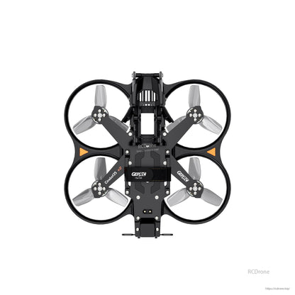 GEPRC Cinebot25 V2 WTFPV, Top-down view of the GEPRC Cinebot25 V2 cinewhoop drone frame with four ducted prop guards and battery strap