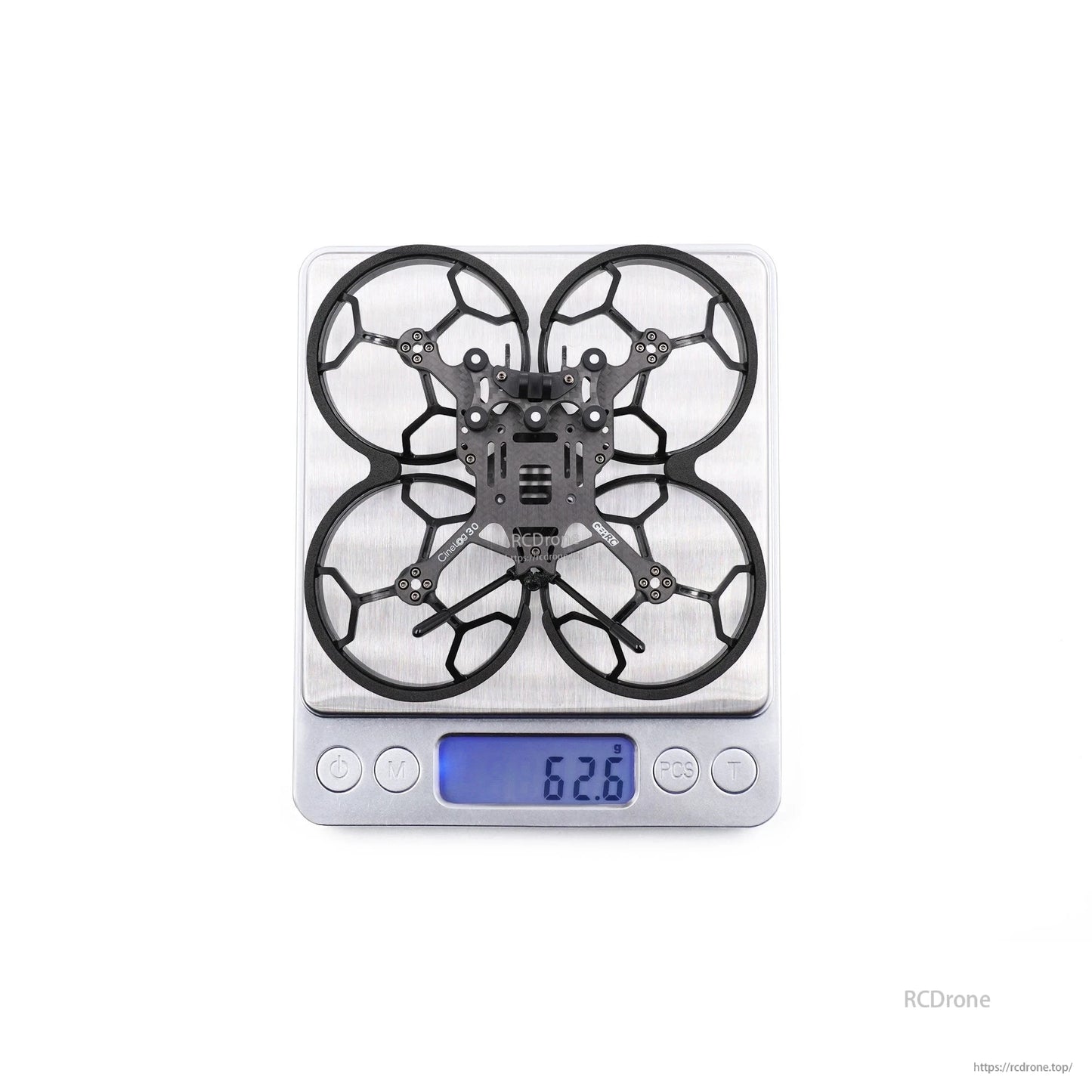 GEPRC GEP-CL30 3-inch FPV frame with ducted prop guards on a digital scale reading 62.6 g