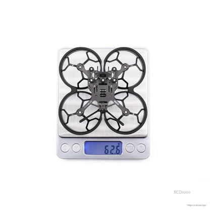 GEPRC GEP-CL30 3-inch FPV frame with ducted prop guards on a digital scale reading 62.6 g