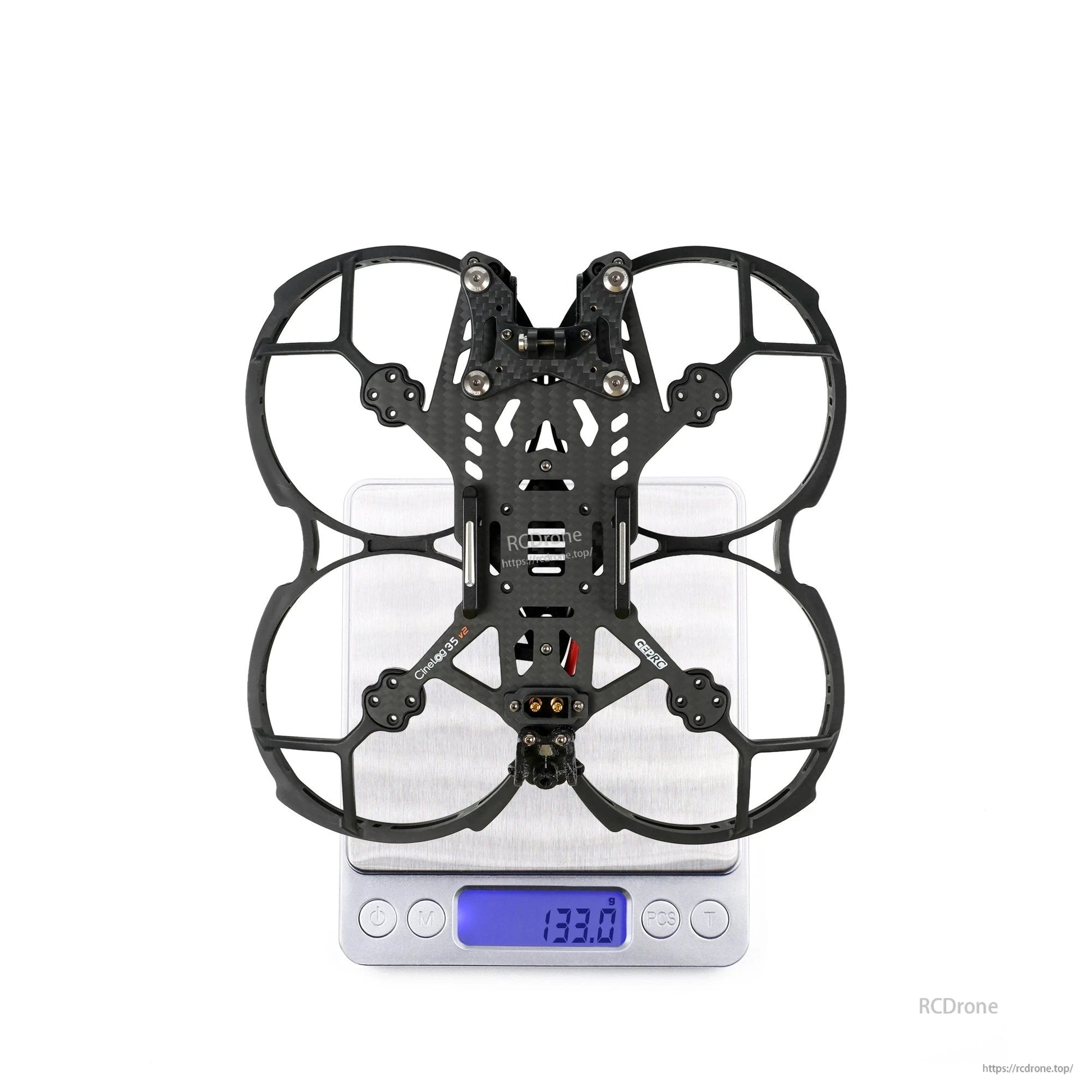 GEPRC GEP-CL35 V2 FPV Frame, GEPRC CineLog35 V2 3.5-inch FPV frame with prop guards, shown on a digital scale reading 133.0 g