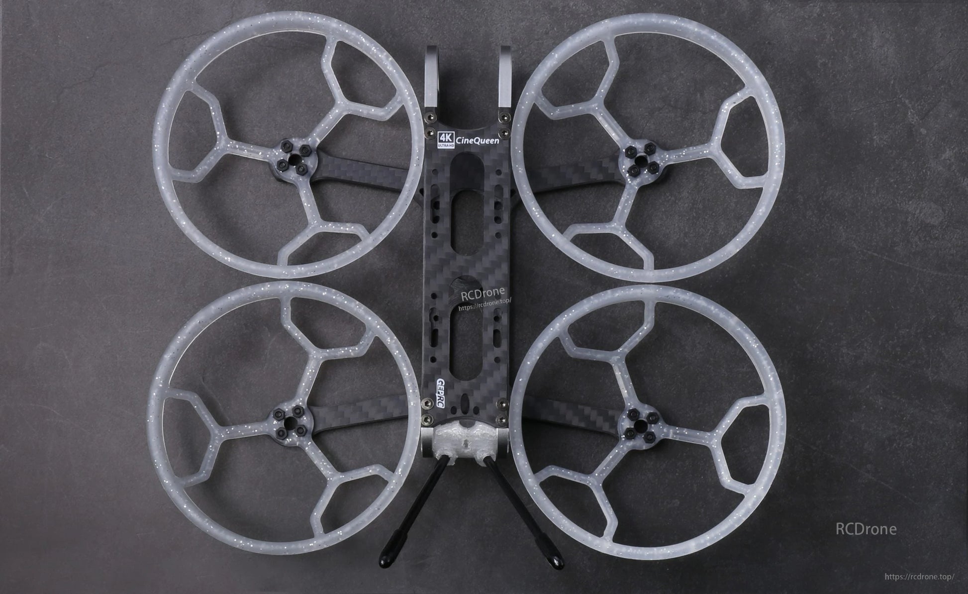 Top view of GEPRC GEP-CQ 3-inch FPV frame with four clear duct prop guards and carbon fiber center plate
