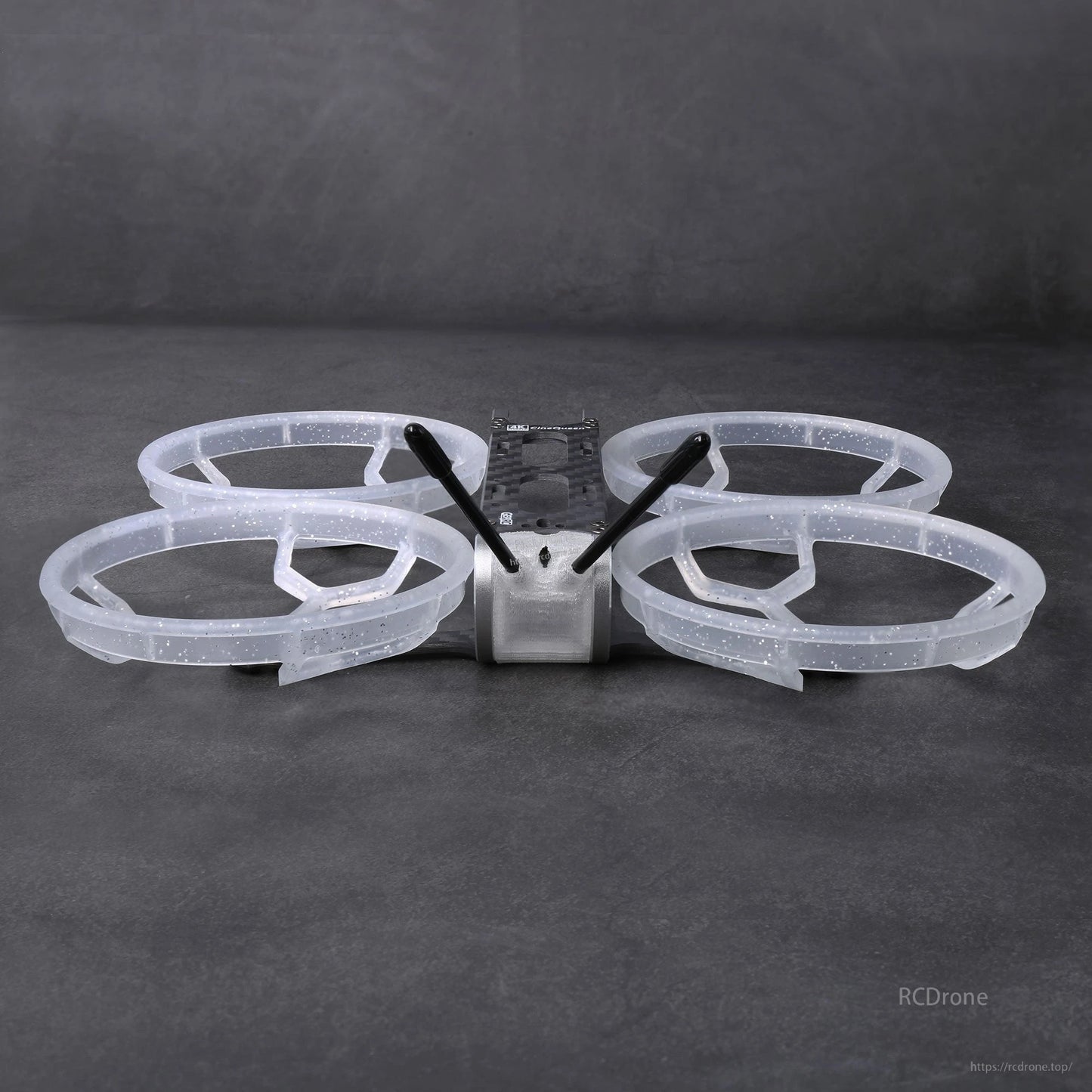 GEPRC GEP-CQ 3-inch FPV frame with carbon center plate, translucent prop-guard ducts, and twin antenna mounts