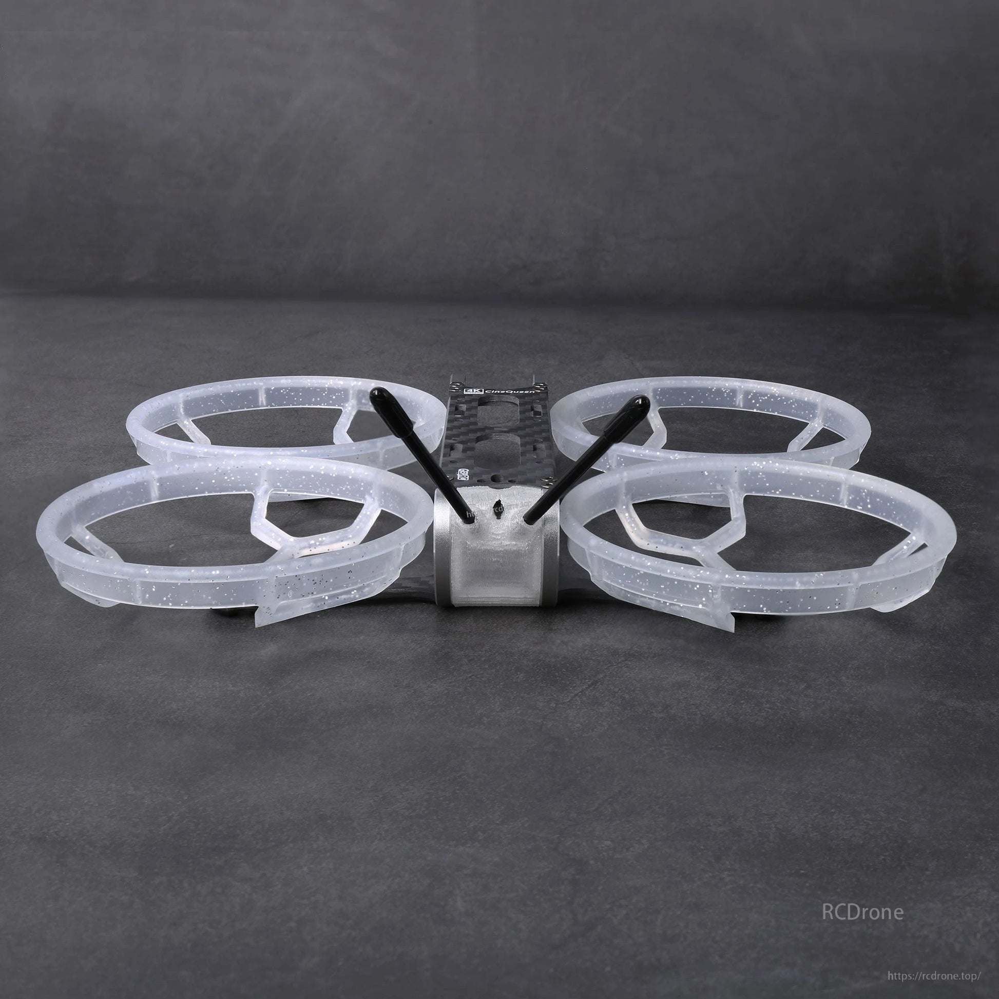 GEPRC GEP-CQ 3-inch FPV frame with carbon center plate, translucent prop-guard ducts, and twin antenna mounts