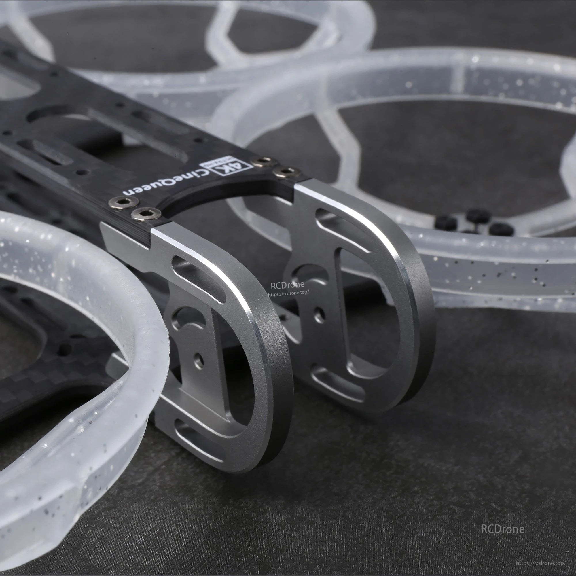 GEPRC GEP-CQ 3-Inch FPV Frame, Close-up of GEPRC GEP-CQ FPV frame with carbon fiber plates, aluminum camera side brackets, and duct rings