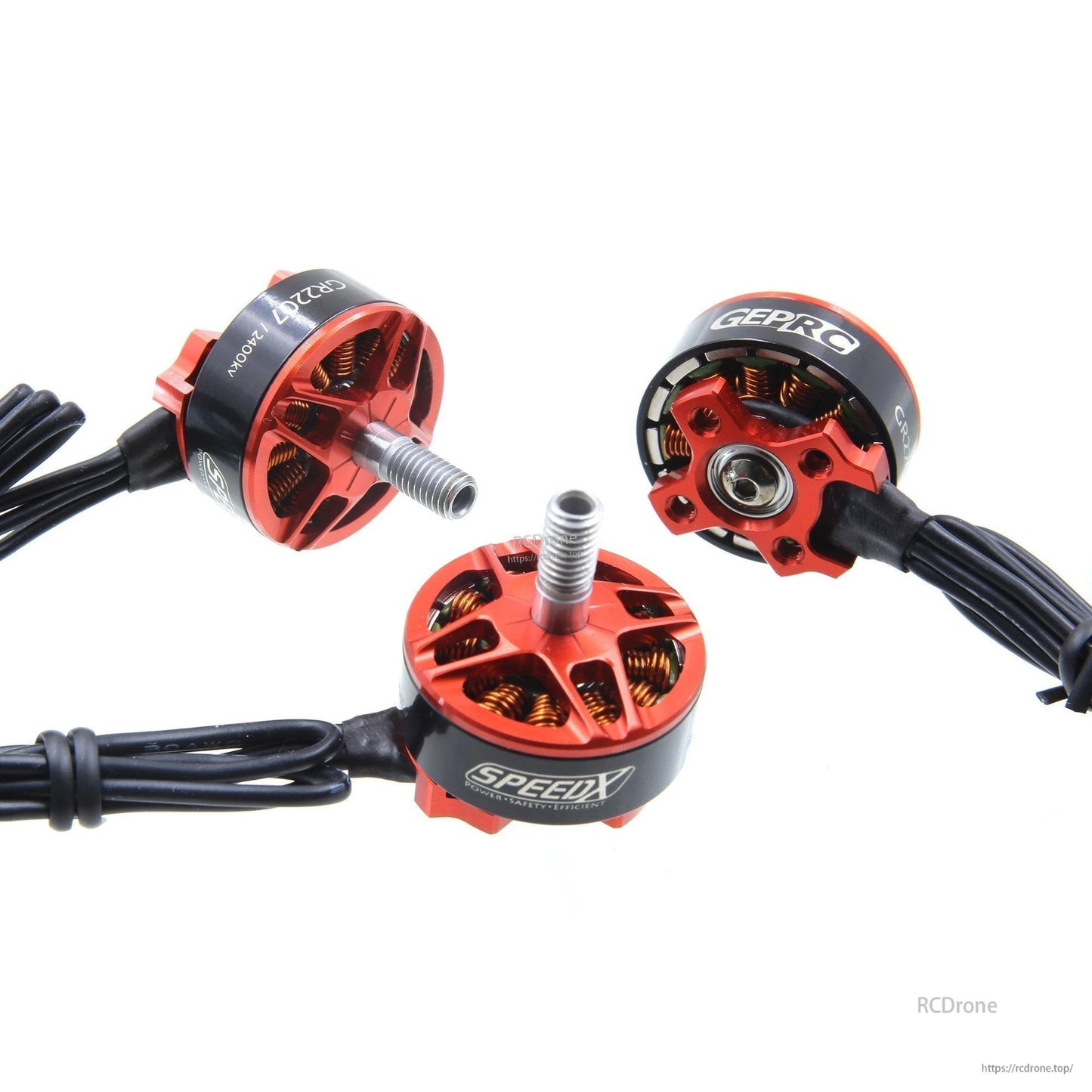 Three GEPRC GEP-GR2207 2400KV brushless FPV motors with red housings, threaded shafts, and black wires