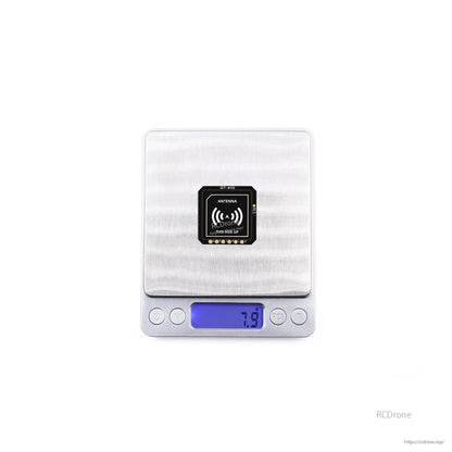 GEPRC GEP-M10 Series GPS, GEPRC GEP-M10 GPS antenna module on a digital scale showing 7.9 g, compact PCB with top-side label