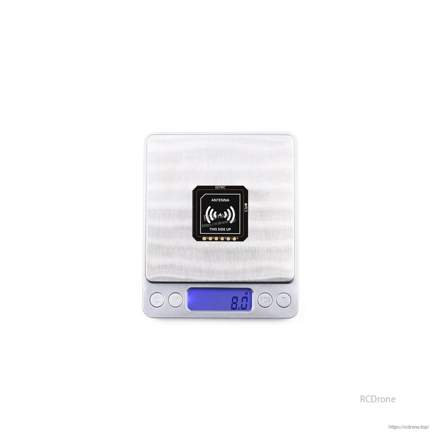 GEPRC GEP-M10 Series GPS, GEPRC GEP-M10 GPS module on a digital scale showing 8.0 g, with antenna side up marking