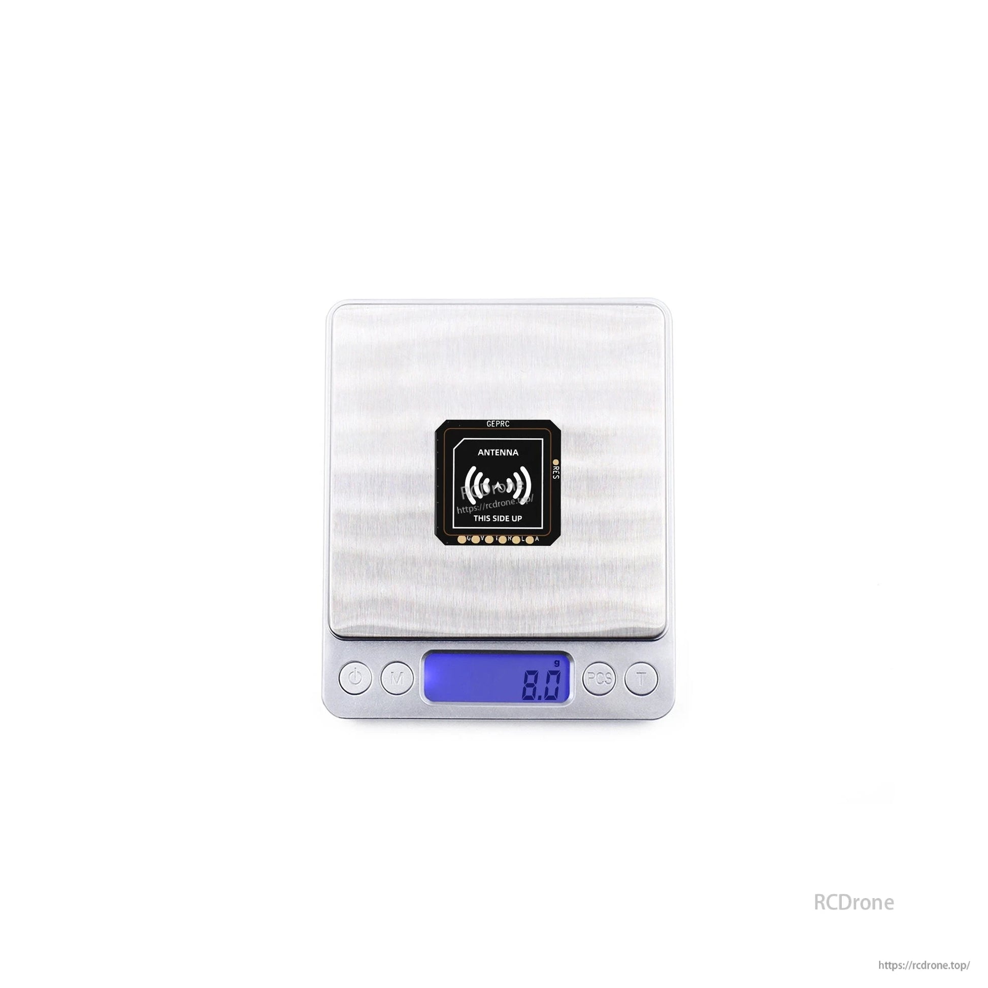 GEPRC GEP-M10 Series GPS, GEPRC GEP-M10 GPS module on a digital scale showing 8.0 g, with antenna side up marking