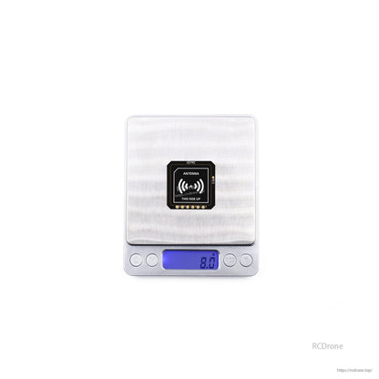GEPRC GEP-M10 Series GPS, GEPRC GEP-M10 GPS module on a digital scale showing 8.0 g, with antenna side up marking