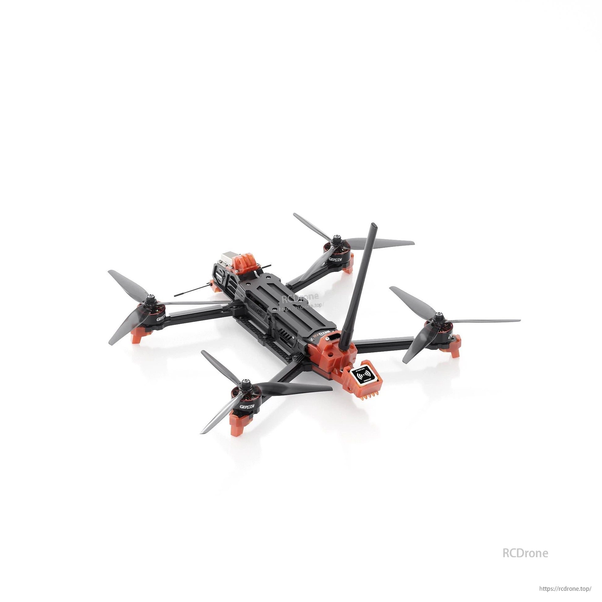 GEPRC MOZ7 V2 WTFPV FPV quadcopter with black frame, four propellers, orange mounts, and dual antennas