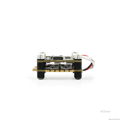 Side view of GEPRC TAKER F722 FPV flight controller and 4-in-1 ESC stack with USB-C port and soft mounts