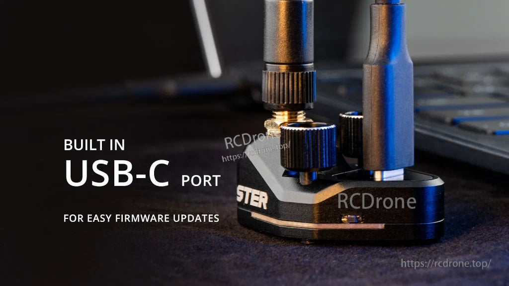 GR-01 receiver base with USB‑C firmware update port and attached 2.4GHz antenna connector