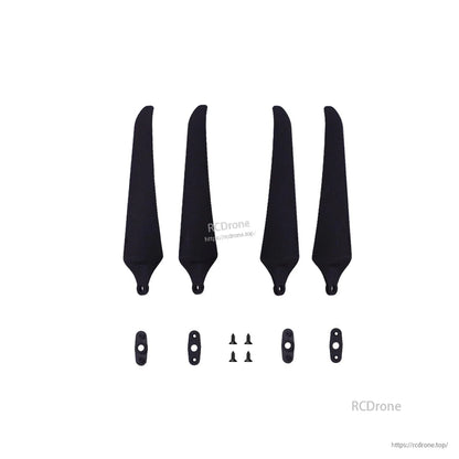 Package contents layout: four black propeller blades, mounting plates, and screws