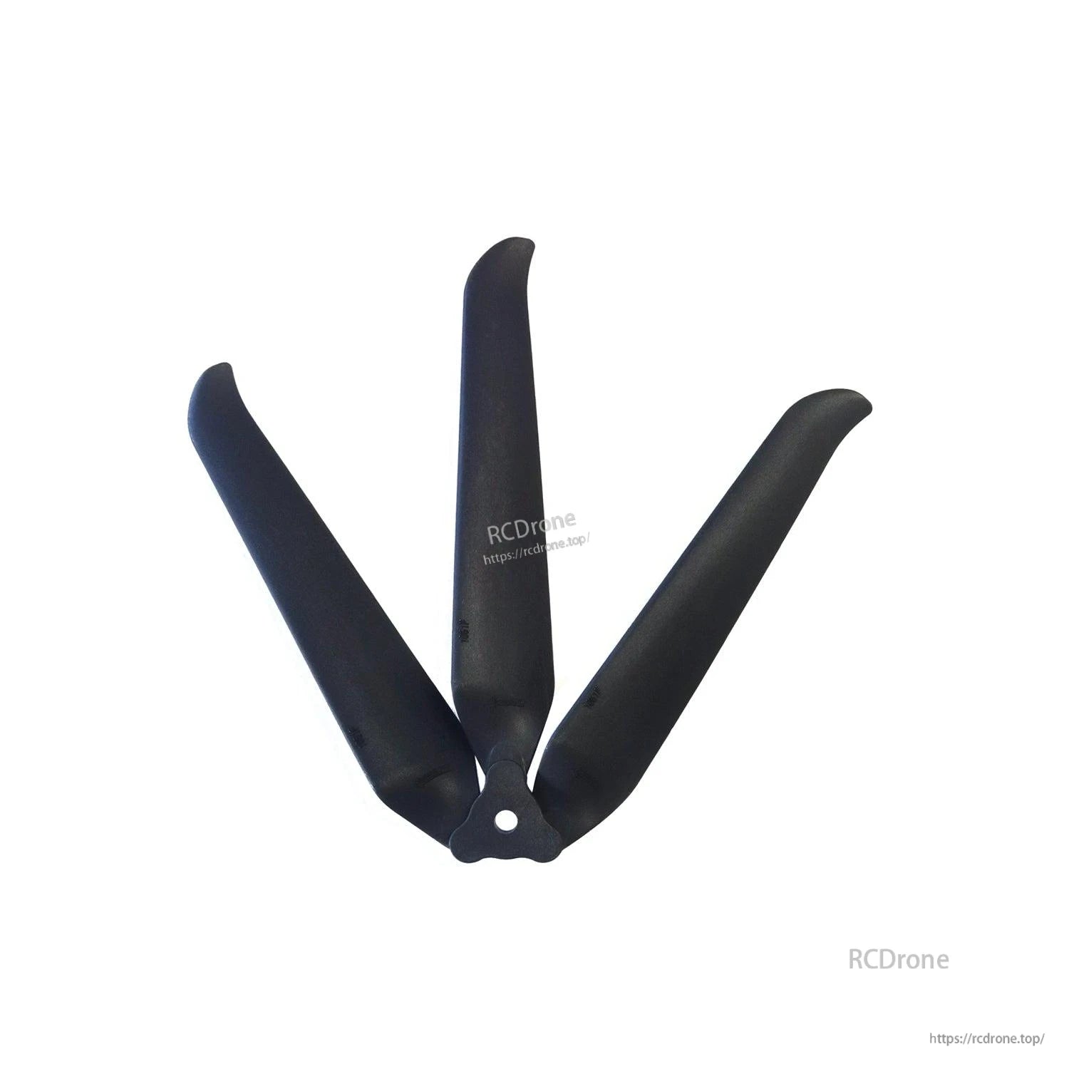 Angled close-up of black three-blade propeller showing blade curvature and center mounting hole