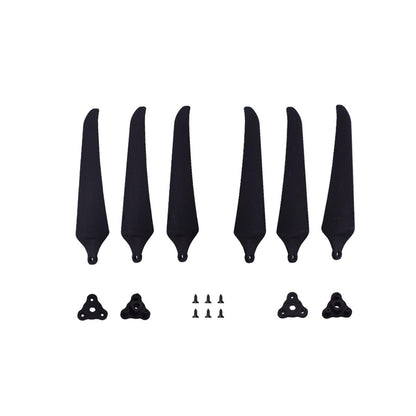 Propeller set parts layout: 6 black blades, hub adapters and mounting screws for 3-blade props