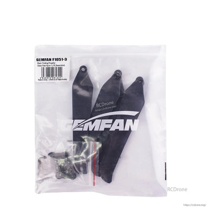 Retail bag with label for Gemfan 1051F-3 black folding propeller set, props and hardware inside