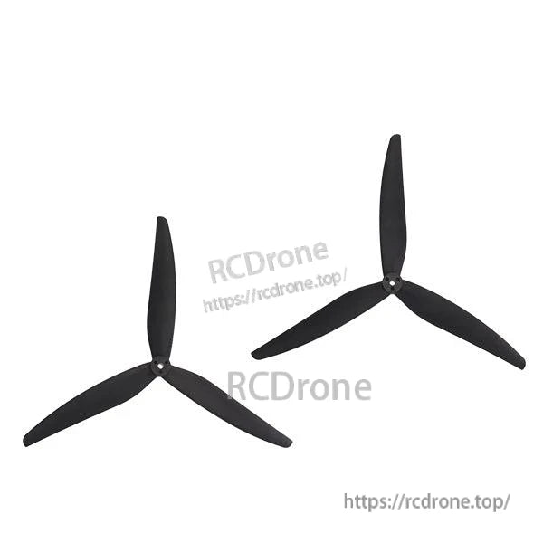 Pair of matching 3-blade propellers shown together on white background, left and right props
