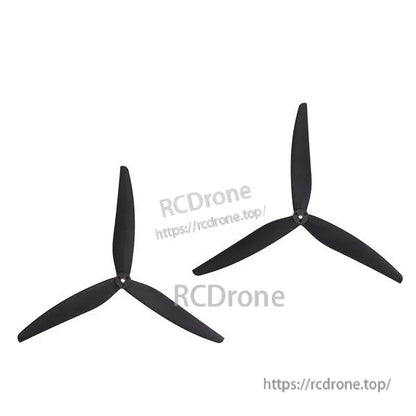 Pair of matching 3-blade propellers shown together on white background, left and right props