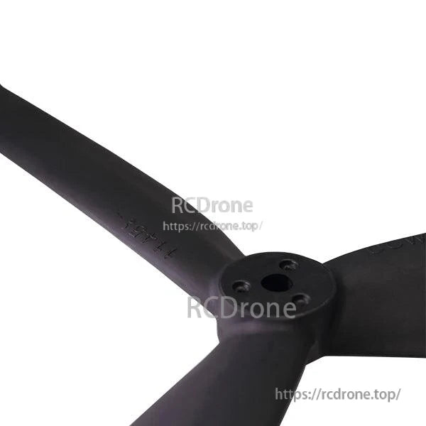 Close-up of propeller hub with center bore and mounting holes, 1145 marking on blade root