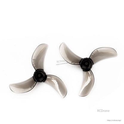 Midnight gray translucent 31mm 3-blade propellers with black hubs, CW and CCW pair
