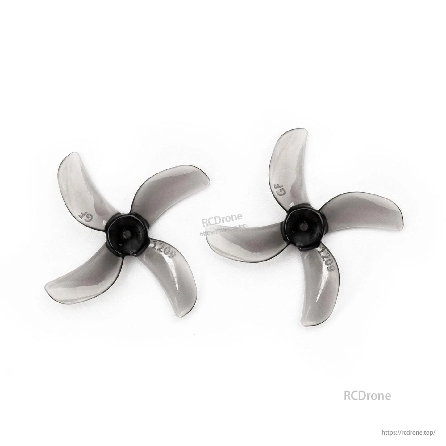 Smoky gray 31mm 4-blade propeller pair with black hub, top view