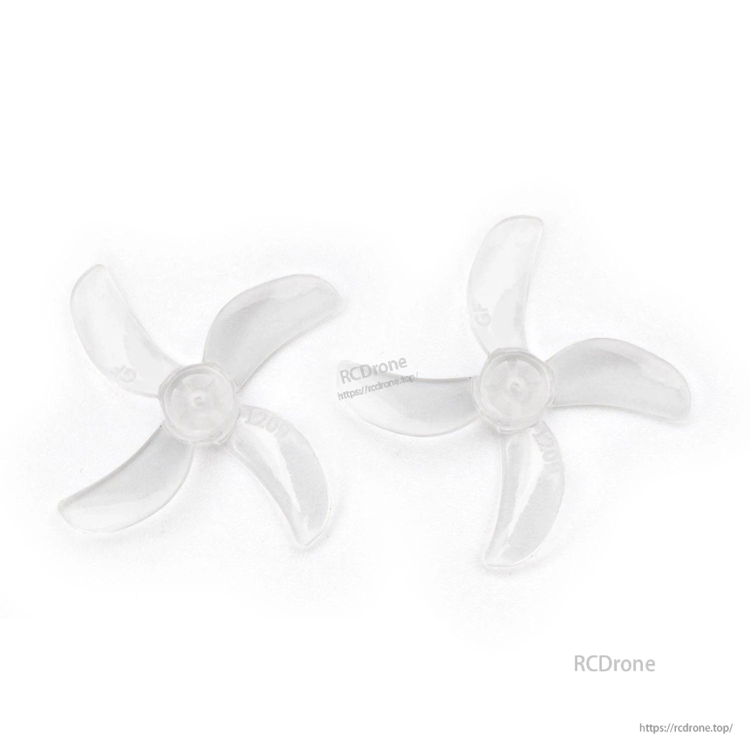Clear transparent 31mm 4-blade propeller pair, top view on white background