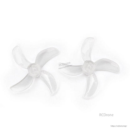 Clear transparent 31mm 4-blade propeller pair, top view on white background