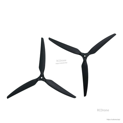 Two assembled folding 3-blade propellers shown side by side in different orientations