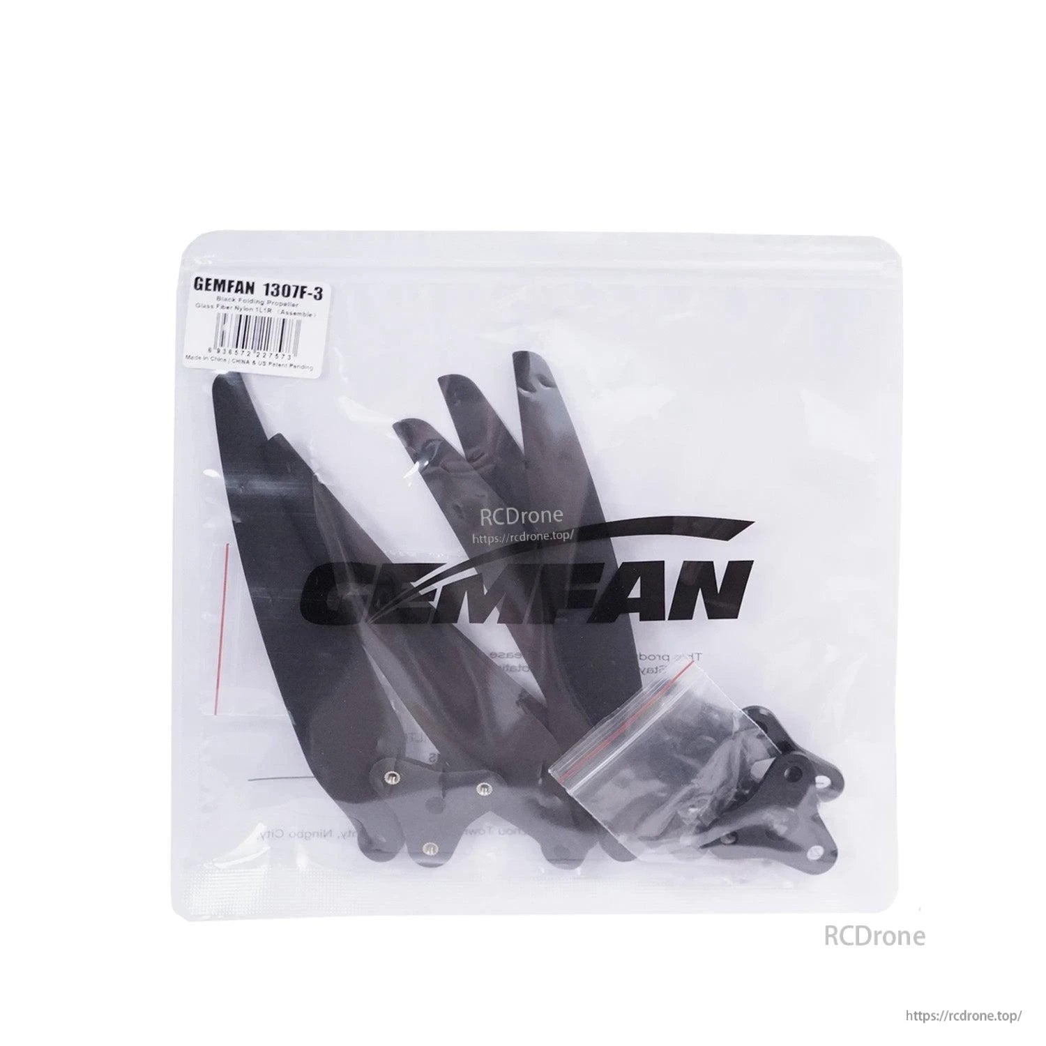 Retail bag packaging labeled Gemfan 1307F-3 with blades and hardware visible inside