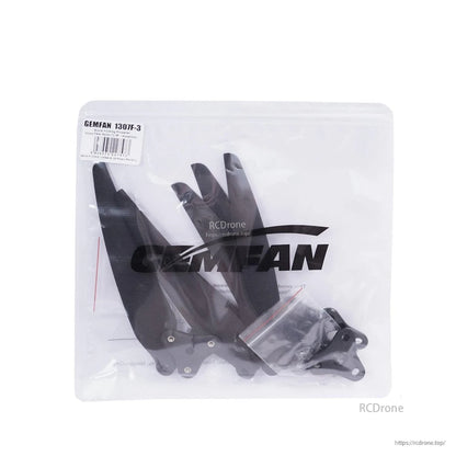 Retail bag packaging labeled Gemfan 1307F-3 with blades and hardware visible inside
