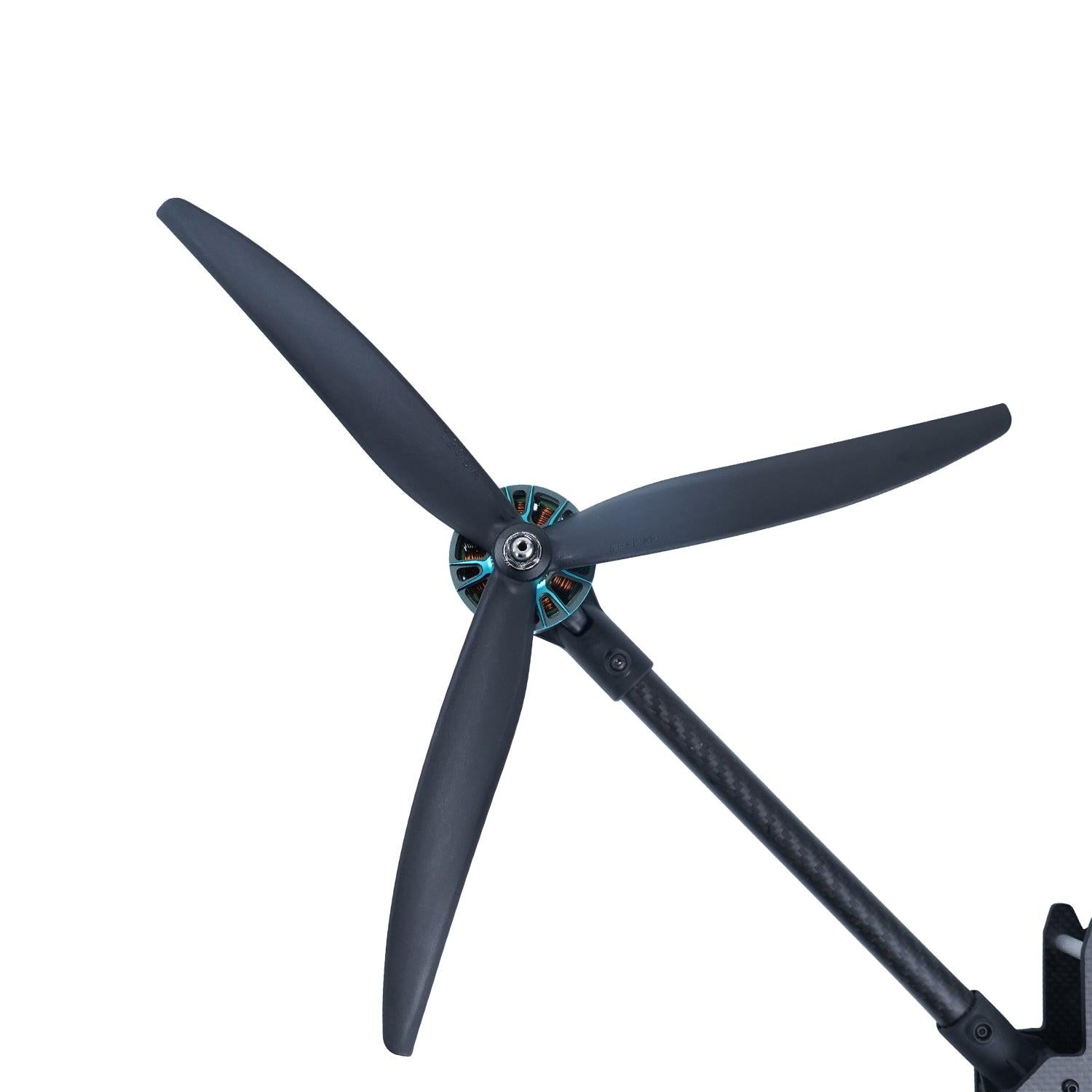 13-inch Gemfan 1309-3 tri-blade propeller installed on motor and carbon arm, close-up