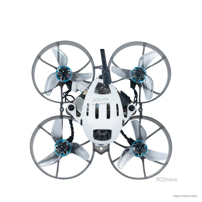Top view of ducted micro quadcopter fitted with four clear gray tri-blade propellers