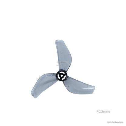 Single clear gray tri-blade propeller close-up showing hub and blade profile