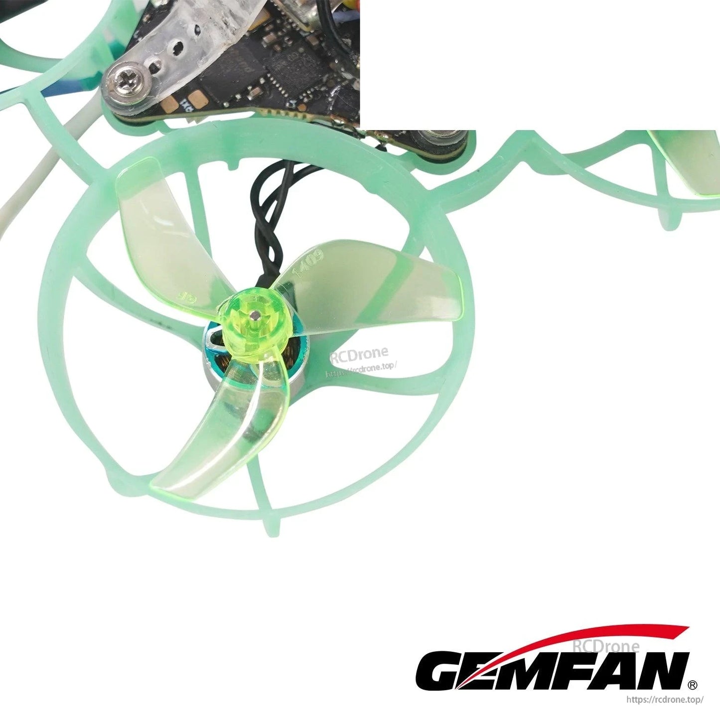 Neon green tri-blade propeller mounted in a green ducted frame, close-up view