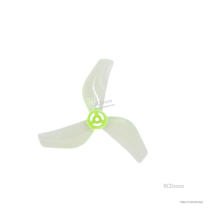 Single neon green tri-blade propeller close-up showing hub and blade shape