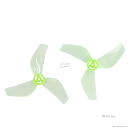 Pair of neon green tri-blade propellers with green hubs, mirrored rotation set