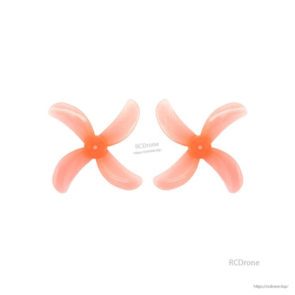 Peach translucent 4-blade propeller pair, top view