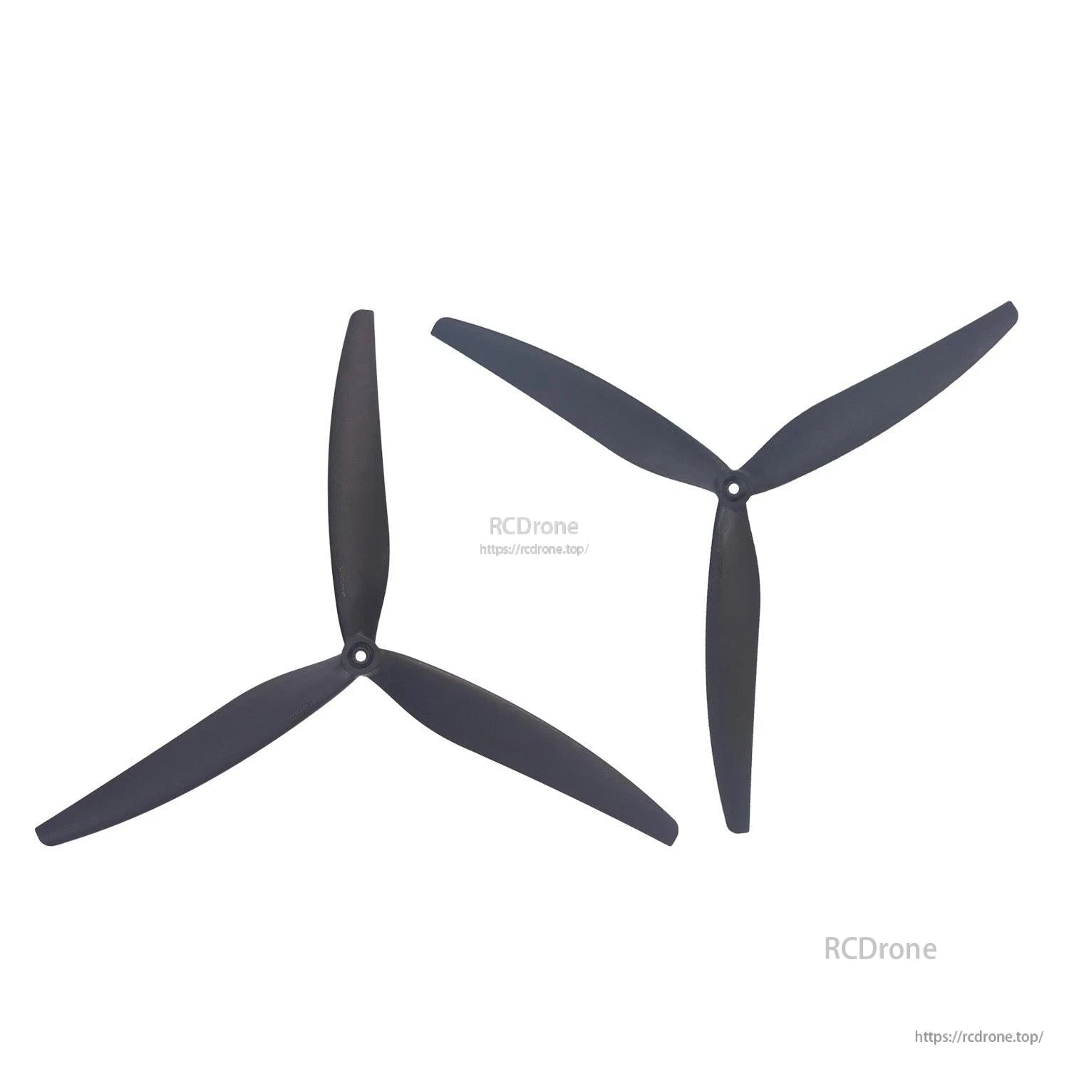 Two black 3-blade propellers on white background, one angled and one upright orientation