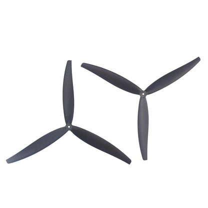 Set of two black 3-blade drone propellers shown side by side, opposite rotation pair