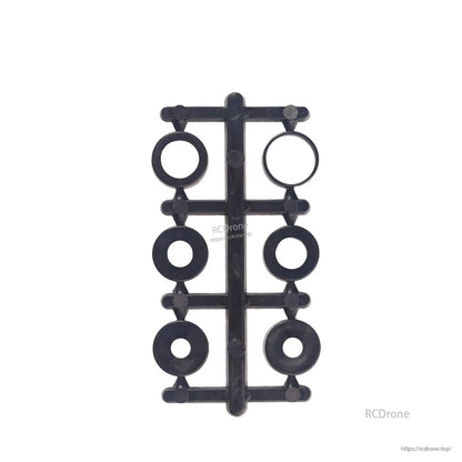 Included adapter rings/spacers shown on plastic sprue, multiple inner diameters