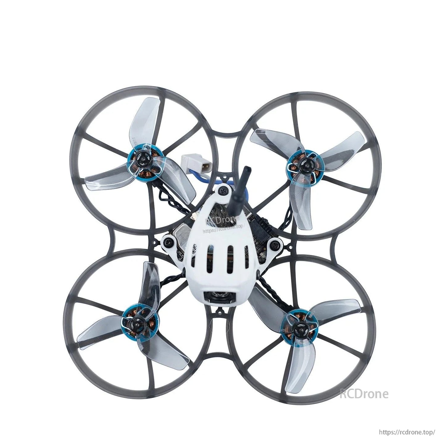 Ducted micro quad top view with clear gray tri-blade props installed in prop guards