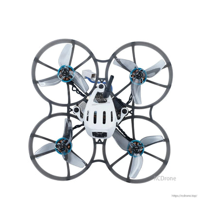 Ducted micro quad top view with clear gray tri-blade props installed in prop guards