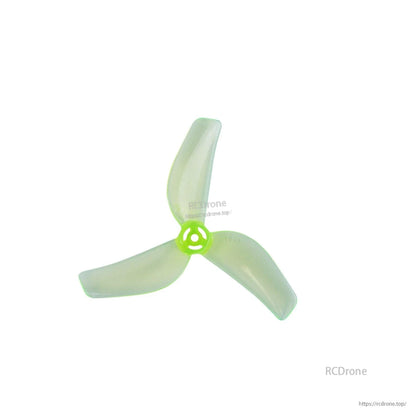 Neon green 3-blade micro drone propeller, top view with tri-blade hub detail