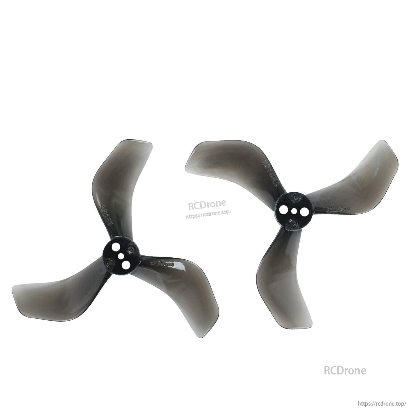 Two clear black tri-blade propellers showing opposite rotation (CW and CCW) hub orientation