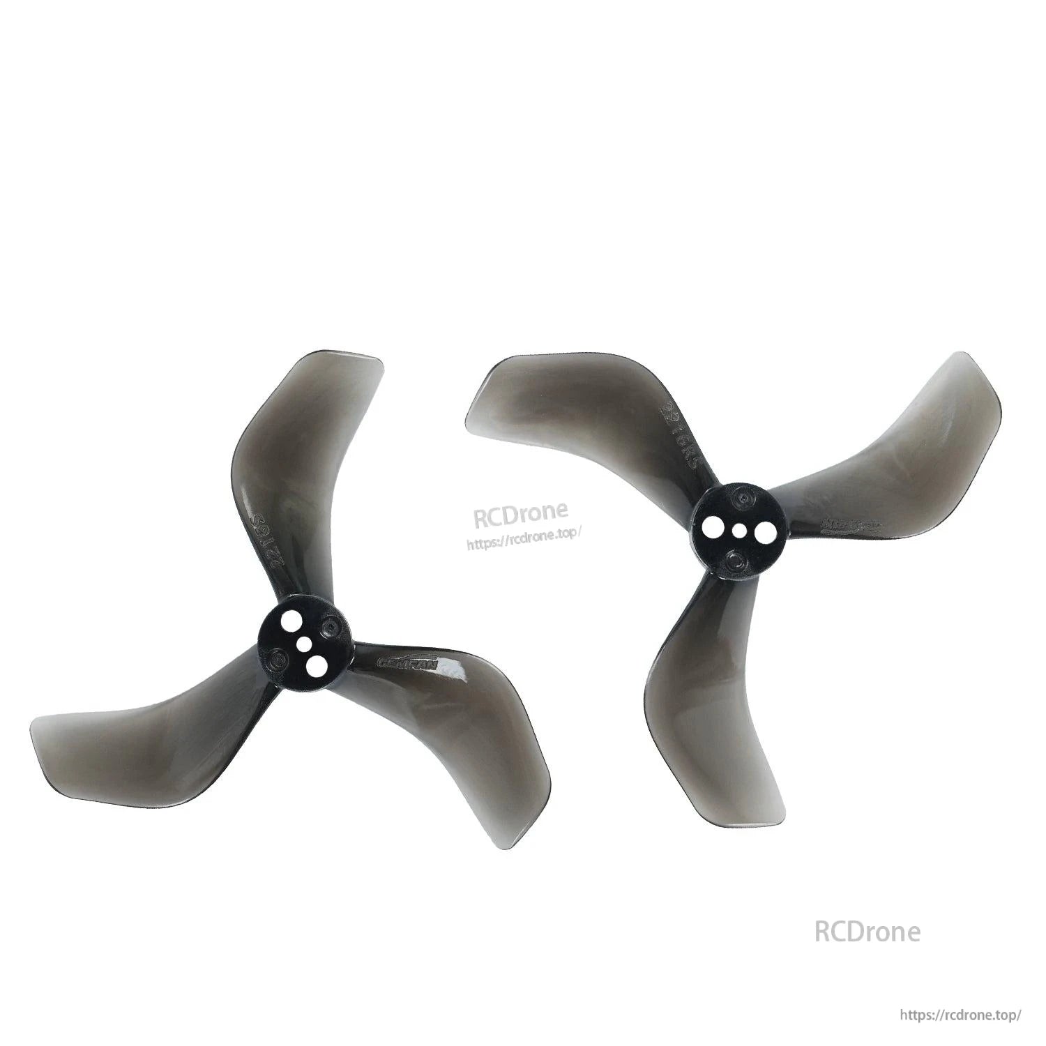 Two clear black tri-blade propellers showing opposite rotation (CW and CCW) hub orientation
