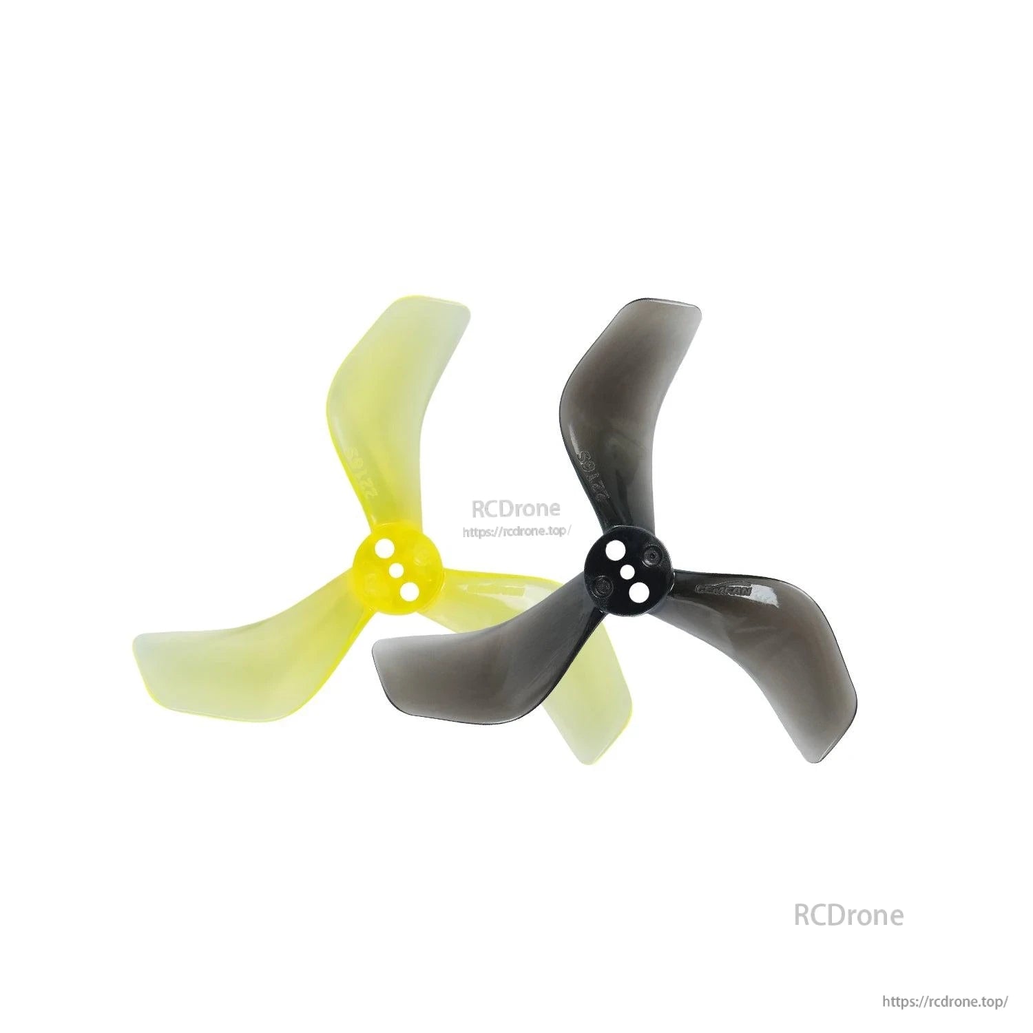 Clear yellow and clear black tri-blade propellers shown together for color comparison