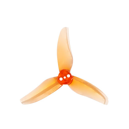 Gemfan 2512-3 tri-blade toothpick propeller in translucent orange, three-bolt mounting hub