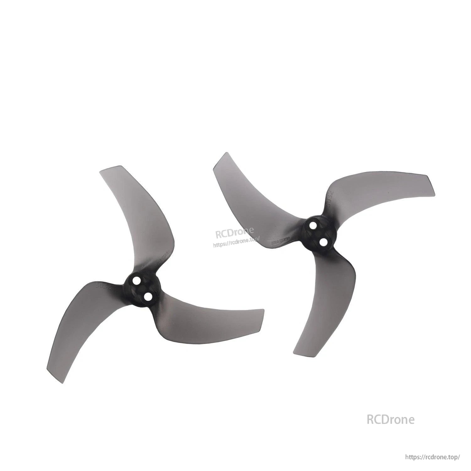 Two clear gray tri-blade propellers displayed as a pair, hub and blade shape detail
